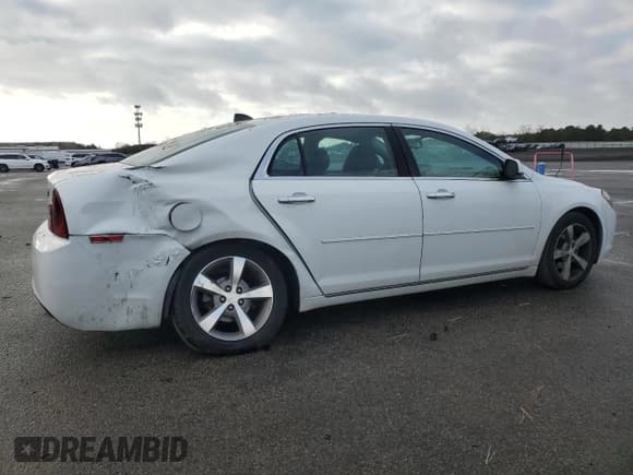 ✅ 2012 Chevrolet Malibu 1LT • VIN: 1G1ZC5E02CF214566 • Lot: 79525494. Listed on Copart with 90,519 mi. Free auction sales archive from the USA and detailed vehicle history report at DreamBid. Image 3.