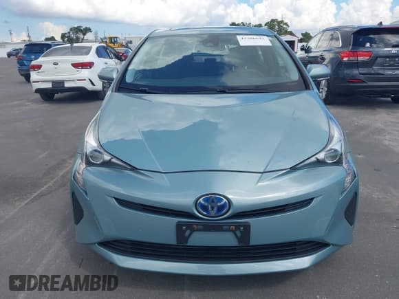 ✅ 2017 Toyota Prius Three • VIN: JTDKARFUXH3030492 • Лот: 43306642. Опубликован ранее на IAAI с пробегом 105 568 миль. Бесплатный доступ к архиву аукционных продаж из США и подробный отчёт об истории автомобиля на DreamBid. Изображение 6.