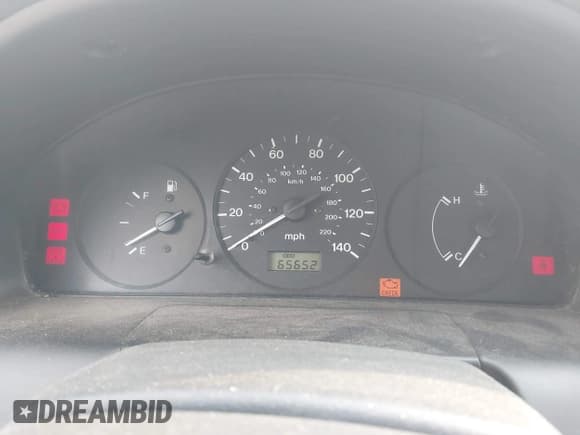 ✅ 1997 Mazda Protege DX • VIN: JM1BC1418V0165780 • Lot: 42735711. Wystawiony na IAAI z przebiegiem 65 652 mil. Bezpłatny archiwum sprzedaży aukcyjnych z USA i szczegółowy raport historii pojazdu na DreamBid. Zdjęcie 7.