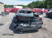 ✅ 2024 BMW 8 Series M850i • VIN: WBAGV8C09RCP31125 • Lot: 42333973. Listed on IAAI with 13,787 mi. Free auction sales archive from the USA and detailed vehicle history report at DreamBid. Image 6.