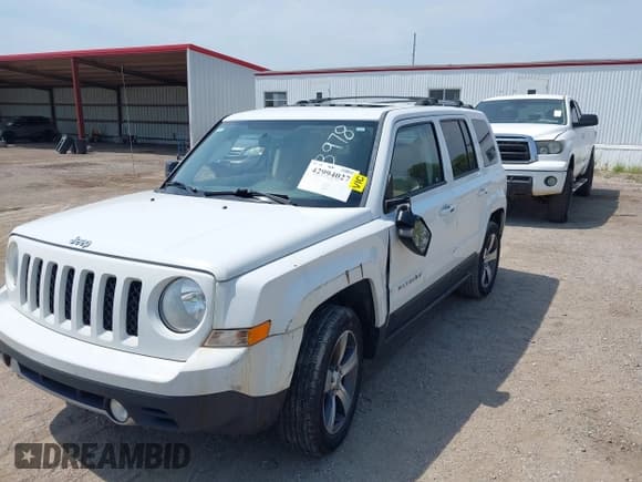 ✅ 2016 Jeep Patriot Latitude • VIN: 1C4NJPFA2GD561606 • Lot: 42994027. Listed on IAAI with 87,561 mi. Free auction sales archive from the USA and detailed vehicle history report at DreamBid. Image 2.