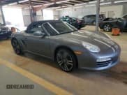 ✅ 2011 Porsche Boxster • VIN: WP0CA2A82BS710129 • Lot: 61922085. Listed on Copart with 49,527 mi. Free auction sales archive from the USA and detailed vehicle history report at DreamBid. Image 4.