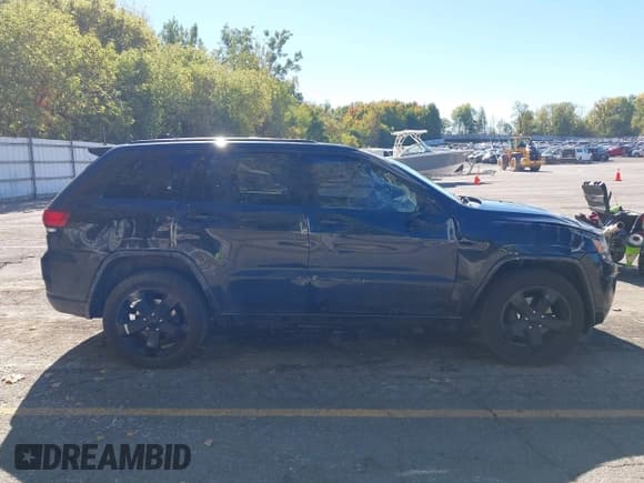 ✅ 2015 Jeep Grand Cherokee Altitude • VIN: 1C4RJFAG0FC164522 • Лот: 43396290. Опубликован ранее на IAAI с пробегом 232 897 миль. Бесплатный доступ к архиву аукционных продаж из США и подробный отчёт об истории автомобиля на DreamBid. Изображение 13.