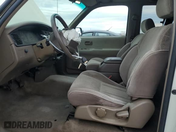 ✅ 1997 Toyota T100 SR5 • VIN: JT4TN14D4V0036802 • Lot: 46488605. Wystawiony na Copart z przebiegiem 182 249 mil. Bezpłatny archiwum sprzedaży aukcyjnych z USA i szczegółowy raport historii pojazdu na DreamBid. Zdjęcie 7.