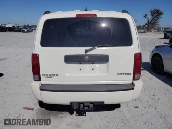 ✅ 2010 Dodge Nitro SE • VIN: 1D4PT2GK7AW112398 • Lot: 91642865. Wystawiony na Copart z przebiegiem 126 917 mil. Bezpłatny archiwum sprzedaży aukcyjnych z USA i szczegółowy raport historii pojazdu na DreamBid. Zdjęcie 6.