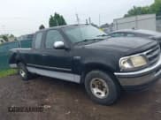 ✅ 1997 Ford F-150 • VIN: 1FTDX1721VNB31166 • Lot: 42616180. Listed on IAAI with 182,452 mi. Free auction sales archive from the USA and detailed vehicle history report at DreamBid. Image 14.