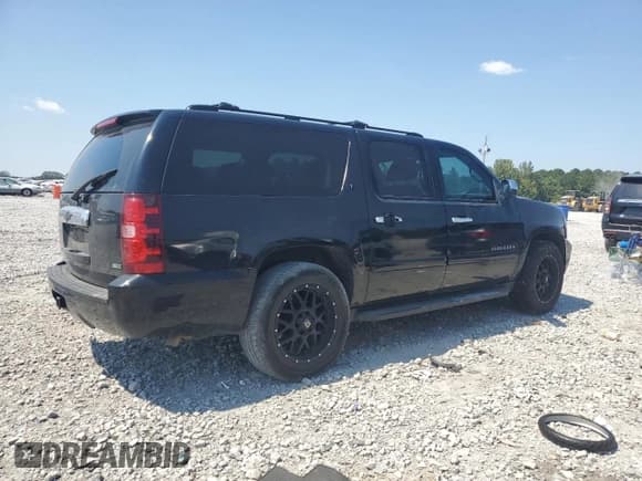 ✅ 2007 Chevrolet Suburban LT • VIN: 3GNFC16077G307421 • Lot: 80148135. Wystawiony na Copart z przebiegiem 289 749 mil. Bezpłatny archiwum sprzedaży aukcyjnych z USA i szczegółowy raport historii pojazdu na DreamBid. Zdjęcie 3.