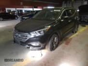 ✅ 2018 Hyundai Santa Fe 2.4L • VIN: 5XYZUDLB2JG535973 • Лот: 79283683. Опубликован ранее на Copart с пробегом Не указан. Бесплатный доступ к архиву аукционных продаж из США и подробный отчёт об истории автомобиля на DreamBid. Изображение 1.
