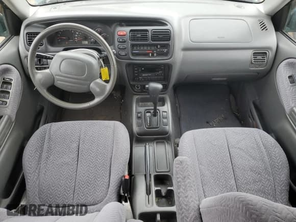 ✅ 2002 Suzuki Grand Vitara • VIN: JS3TE62V524154419 • Lot: 52992735. Wystawiony na Copart z przebiegiem 123 749 mil. Bezpłatny archiwum sprzedaży aukcyjnych z USA i szczegółowy raport historii pojazdu na DreamBid. Zdjęcie 8.