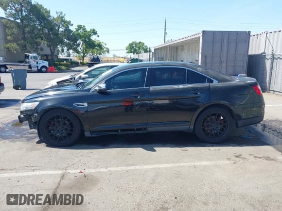 ✅ 2013 Ford Taurus Limited • VIN: 1FAHP2F82DG133885 • Lot: 42393686. Listed on IAAI with 141,912 mi. Free auction sales archive from the USA and detailed vehicle history report at DreamBid. Image 15.
