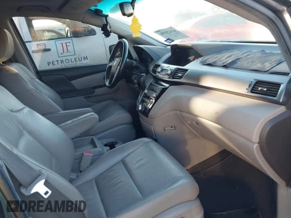 ✅ 2012 Honda Odyssey Touring • VIN: 5FNRL5H92CB069468 • Lot: 43429356. Listed on IAAI with 152,503 mi. Free auction sales archive from the USA and detailed vehicle history report at DreamBid. Image 5.
