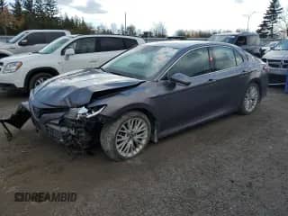 2018 Toyota Camry Hybrid XLE with VIN 4T1B21HK2JU502772, listed as a Copart auction lot 86451735 with 232,853 mi miles and Clean title. Bid and sale history available at DreamBid. Image 1.