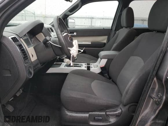 2009 Mercury Mariner z VIN 4M2CU81G39KJ17532, wystawiony jako Copart lot #43907455 z przebiegiem 214 212 mil mil oraz Szkoda całkowita • Salvage title. Historia ofert i sprzedaży dostępna na DreamBid. Obrazek 7.