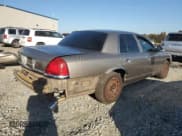 ✅ 2005 Ford Police Interceptor • VIN: 2FAFP71W95X164931 • Lot: 90994005. Listed on Copart with 168,289 mi. Free auction sales archive from the USA and detailed vehicle history report at DreamBid. Image 3.