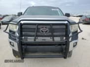 ✅ 2014 Toyota Tundra SR5 • VIN: 5TFDM5F14EX051518 • Lot: 76700424. Listed on Copart with 157,451 mi. Free auction sales archive from the USA and detailed vehicle history report at DreamBid. Image 5.