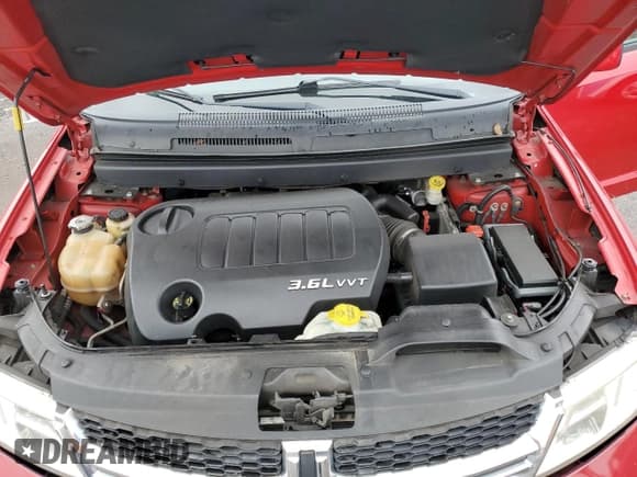 ✅ 2013 Dodge Journey SXT • VIN: 3C4PDDBG4DT519078 • Lot: 82585735. Listed on Copart with 95,501 mi. Free auction sales archive from the USA and detailed vehicle history report at DreamBid. Image 12.