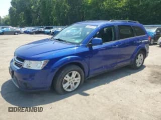 ✅ 2012 Dodge Journey SXT • VIN: 3C4PDCBB6CT324709 • Lot: 63300405. Listed on Copart with 179,946 mi. Free auction sales archive from the USA and detailed vehicle history report at DreamBid. Image 1.