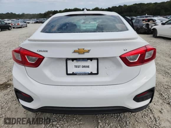 2017 Chevrolet Cruze LT с VIN 1G1BE5SM9H7110533, выставлен на аукционе Copart как лот 86123325 с пробегом 67 951 миль миль и Списание • Salvage title. История ставок и продаж доступна на DreamBid. Изображение 6.