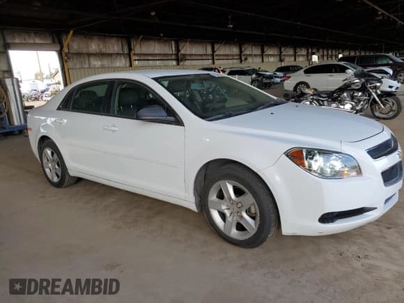 ✅ 2012 Chevrolet Malibu 1LS • VIN: 1G1ZB5E07CF246867 • Lot: 85385894. Listed on Copart with 210,783 mi. Free auction sales archive from the USA and detailed vehicle history report at DreamBid. Image 4.