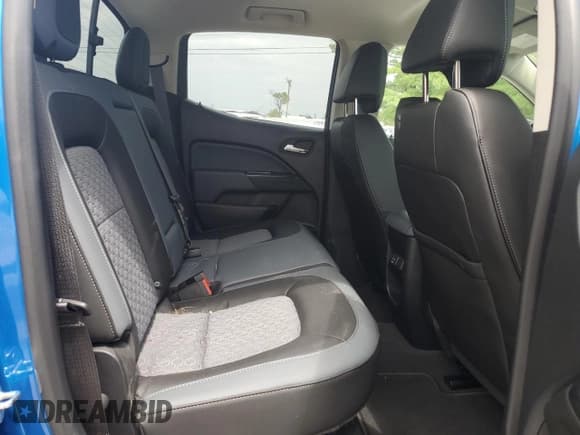 ✅ 2022 Chevrolet Colorado 4WD Z71 • VIN: 1GCGTDEN9N1149851 • Лот: 66387524. Опубликован ранее на Copart с пробегом 28 137 миль. Бесплатный доступ к архиву аукционных продаж из США и подробный отчёт об истории автомобиля на DreamBid. Изображение 10.