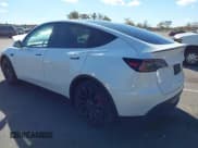 ✅ 2022 Tesla Model Y Performance • VIN: 7SAYGDEF9NF382723 • Lot: 43501574. Listed on IAAI with 46,885 mi. Free auction sales archive from the USA and detailed vehicle history report at DreamBid. Image 3.