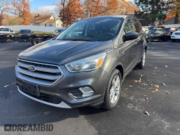 ✅ 2017 Ford Escape SE • VIN: 1FMCU9GD0HUD02497 • Lot: 93264155. Listed on Copart with 124,678 mi. Free auction sales archive from the USA and detailed vehicle history report at DreamBid. Image 1.