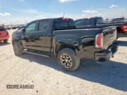 ✅ 2021 GMC Canyon 4WD AT4 • VIN: 1GTG6FEN1M1103173 • Lot: 65282525. Listed on Copart with 58,829 mi. Free auction sales archive from the USA and detailed vehicle history report at DreamBid. Image 2.