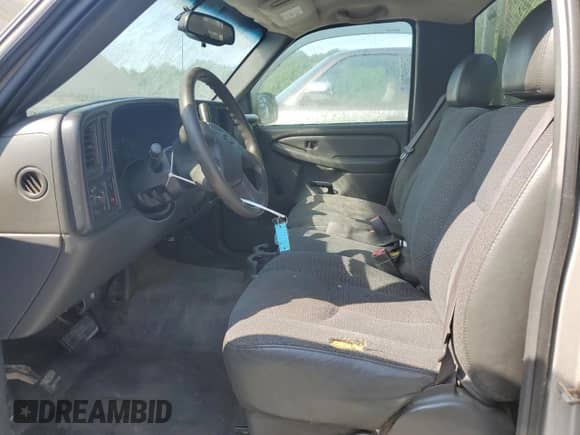 2004 Chevrolet Silverado 1500 LS z VIN 1GCEC14T84E230899, wystawiony jako Copart lot #60497185 z przebiegiem 227 145 mil mil oraz Czysty tytuł • Clean title. Historia ofert i sprzedaży dostępna na DreamBid. Obrazek 7.