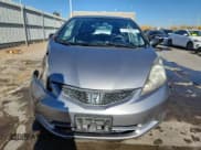 ✅ 2009 Honda Fit • VIN: JHMGE88219C006579 • Lot: 91298605. Listed on Copart with 150,024 mi. Free auction sales archive from the USA and detailed vehicle history report at DreamBid. Image 5.