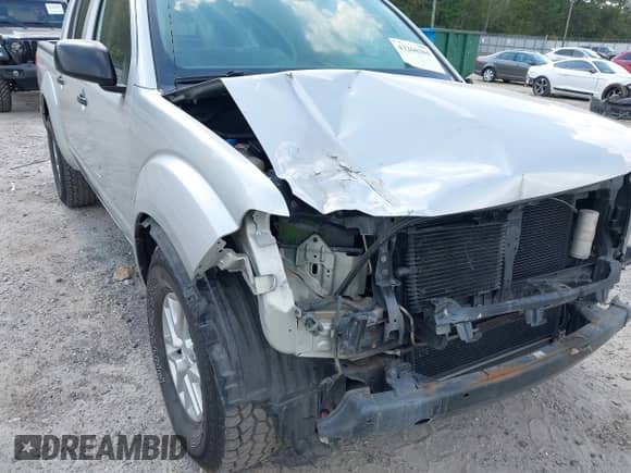 2014 Nissan Frontier Desert Runner z VIN 1N6AD0ER0EN733673, wystawiony jako IAAI lot #43260104 z przebiegiem 163 382 mil mil oraz . Historia ofert i sprzedaży dostępna na DreamBid. Obrazek 6.