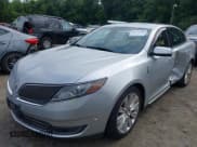 ✅ 2013 Lincoln MKS EcoBoost • VIN: 1LNHL9FT7DG617341 • Lot: 42723688. Listed on IAAI with 146,197 mi. Free auction sales archive from the USA and detailed vehicle history report at DreamBid. Image 2.