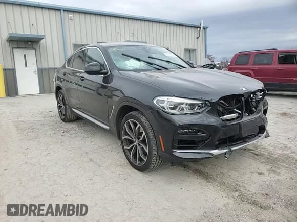 ✅ 2021 BMW X4 xDrive30i • VIN: 5UX2V1C02M9F43235 • Lot: 92528985. Listed on Copart with 38,569 mi. Free auction sales archive from the USA and detailed vehicle history report at DreamBid. Image 14.