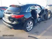 ✅ 2014 Infiniti QX70 • VIN: JN8CS1MWXEM410367 • Lot: 40896209. Listed on IAAI with Not provided. Free auction sales archive from the USA and detailed vehicle history report at DreamBid. Image 4.