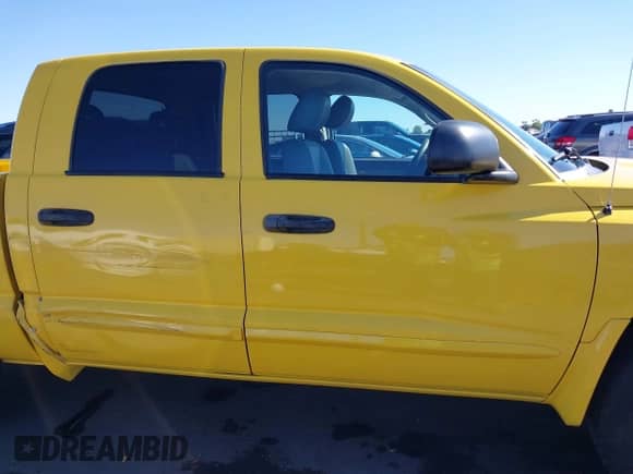 2006 Dodge Dakota SLT z VIN 1D7HW48J46S584508, wystawiony jako IAAI lot #40732421 z przebiegiem 148 957 mil mil oraz . Historia ofert i sprzedaży dostępna na DreamBid. Obrazek 13.