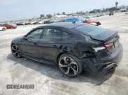 ✅ 2021 Audi RS 5 Sportback • VIN: WUAAWCF53MA904838 • Лот: 56450664. Опубликован ранее на Copart с пробегом 46 020 миль. Бесплатный доступ к архиву аукционных продаж из США и подробный отчёт об истории автомобиля на DreamBid. Изображение 2.