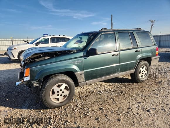 ✅ 1994 Jeep Grand Cherokee Laredo • VIN: 1J4GZ58S7RC281999 • Лот: 91922365. Опубликован ранее на Copart с пробегом 971 837 миль. Бесплатный доступ к архиву аукционных продаж из США и подробный отчёт об истории автомобиля на DreamBid. Изображение 1.