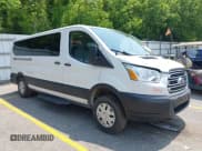 ✅ 2019 Ford Transit Passenger XL • VIN: 1FBZX2YM4KKB64966 • Lot: 42417498. Listed on IAAI with 157,311 mi. Free auction sales archive from the USA and detailed vehicle history report at DreamBid. Image 1.