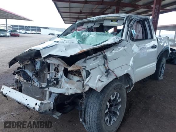 ✅ 2021 Toyota Tacoma SR • VIN: 3TYRX5GN0MT027871 • Lot: 43022019. Listed on IAAI with 135,807 mi. Free auction sales archive from the USA and detailed vehicle history report at DreamBid. Image 2.
