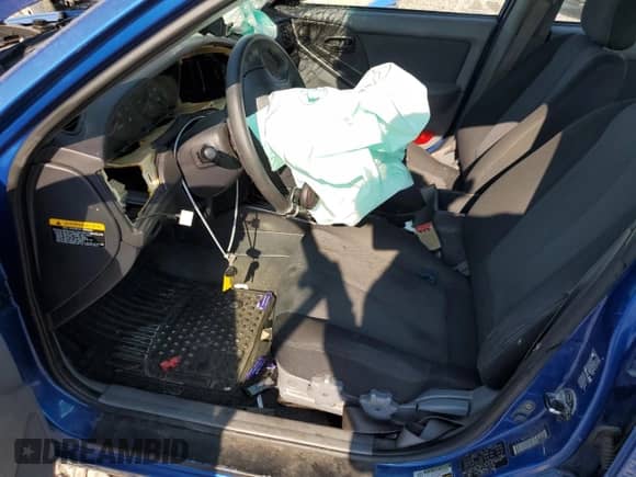 2005 Hyundai Elantra GLS z VIN KMHDN56D05U173782, wystawiony jako Copart lot #62067184 z przebiegiem 174 047 mil mil oraz Szkoda całkowita • Salvage title. Historia ofert i sprzedaży dostępna na DreamBid. Obrazek 7.