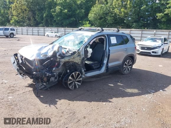 ✅ 2022 Volkswagen Taos SE • VIN: 3VVPX7B25NM070388 • Лот: 42708530. Опубликован ранее на IAAI с пробегом Не указан. Бесплатный доступ к архиву аукционных продаж из США и подробный отчёт об истории автомобиля на DreamBid. Изображение 2.