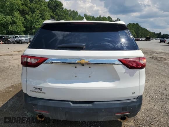 ✅ 2021 Chevrolet Traverse LT • VIN: 1GNERHKW4MJ265801 • Lot: 68318865. Wystawiony na Copart z przebiegiem 53 239 mil. Bezpłatny archiwum sprzedaży aukcyjnych z USA i szczegółowy raport historii pojazdu na DreamBid. Zdjęcie 6.