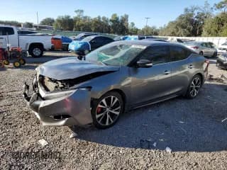 ✅ 2016 Nissan Maxima Platinum • VIN: 1N4AA6AP1GC387947 • Lot: 92034585. Wystawiony na Copart z przebiegiem Nie podano. Bezpłatny archiwum sprzedaży aukcyjnych z USA i szczegółowy raport historii pojazdu na DreamBid. Zdjęcie 1.