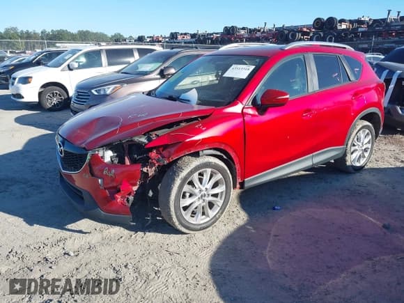 ✅ 2015 Mazda CX-5 Grand Touring • VIN: JM3KE2DY8F0491553 • Lot: 43513318. Wystawiony na IAAI z przebiegiem 180 774 mil. Bezpłatny archiwum sprzedaży aukcyjnych z USA i szczegółowy raport historii pojazdu na DreamBid. Zdjęcie 2.