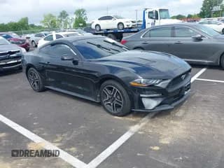 ✅ 2021 Ford Mustang EcoBoost • VIN: 1FA6P8TH9M5137636 • Lot: 42231432. Listed on IAAI with 35,017 mi. Free auction sales archive from the USA and detailed vehicle history report at DreamBid. Image 1.