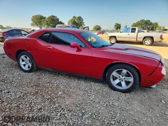 ✅ 2012 Dodge Challenger SXT • VIN: 2C3CDYAG7CH167519 • Lot: 84876065. Listed on Copart with 191,271 mi. Free auction sales archive from the USA and detailed vehicle history report at DreamBid. Image 4.