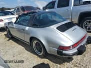 ✅ 1986 Porsche 911 • VIN: WP0EB0917GS161455 • Lot: 74672764. Wystawiony na Copart z przebiegiem 80 076 mil. Bezpłatny archiwum sprzedaży aukcyjnych z USA i szczegółowy raport historii pojazdu na DreamBid. Zdjęcie 2.
