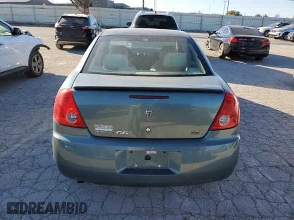 ✅ 2009 Pontiac G6 1SA • VIN: 1G2ZG57B194175150 • Лот: 77523714. Опубликован ранее на Copart с пробегом 90 784 миль. Бесплатный доступ к архиву аукционных продаж из США и подробный отчёт об истории автомобиля на DreamBid. Изображение 6.