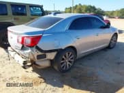 ✅ 2014 Chevrolet Malibu LTZ • VIN: 1G11H5SL6EF117001 • Lot: 43325344. Listed on IAAI with 183,202 mi. Free auction sales archive from the USA and detailed vehicle history report at DreamBid. Image 4.