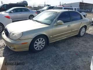 2002 Hyundai Sonata GLS z VIN KMHWF35HX2A506484, wystawiony jako IAAI lot #41257939 z przebiegiem 280 153 mil mil oraz . Historia ofert i sprzedaży dostępna na DreamBid. Obrazek 2.