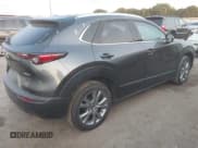 ✅ 2023 Mazda CX-30 S Premium • VIN: 3MVDMBDM4PM526636 • Lot: 42945074. Listed on IAAI with 50,441 mi. Free auction sales archive from the USA and detailed vehicle history report at DreamBid. Image 4.